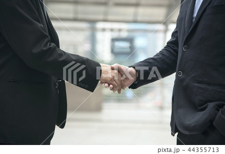 Businessman making handshake agreement.  44355713