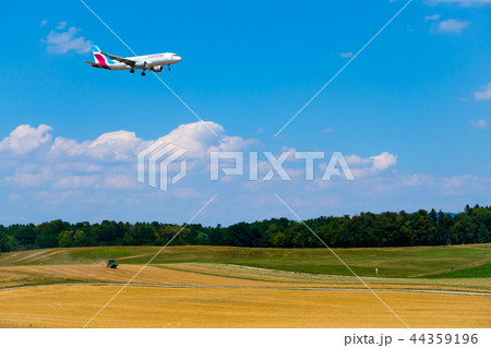 Eurowings airlines airplane preparing for landing at day time in international airport 44359196