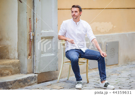 Young man background the old european city take selfie 44359631
