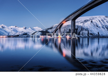 Bridge with illumination and mountains at night Bridge with illumination and mountains at night 44359828