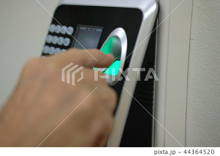 hand scanning finger print on access control machine. hour work time recording & security 44364520