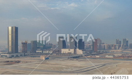 Buildings on Al Reem island in Abu Dhabi timelapse from above. Buildings on Al Reem island in Abu Dhabi timelapse from above. 44365753