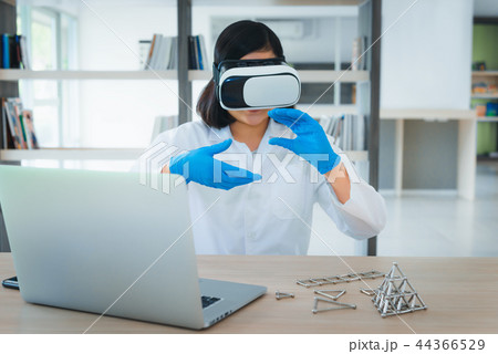 Portrait of scientist is using virtual reality  44366529