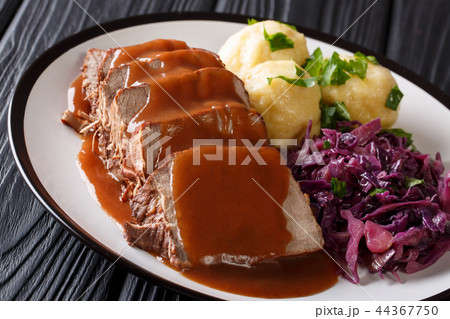 Delicious traditional German dinner Sauerbraten Delicious traditional German dinner Sauerbraten 44367750