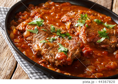 Classic Swiss steak fried and slowly cooked 44367820