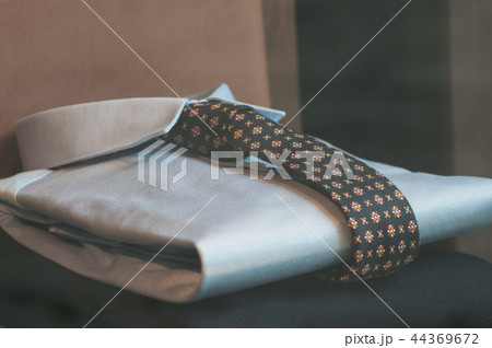 blue shirt and tie in a fashion store showroom blue shirt and tie in a fashion store showroom 44369672
