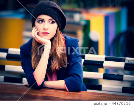 Beautiful girl at the cafe. Beautiful girl at the cafe. 44370216