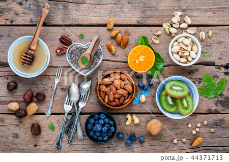 Ingredients for a healthy foods background. 44371713