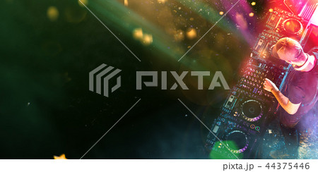 Dj mixes the track in the nightclub at a party 44375446