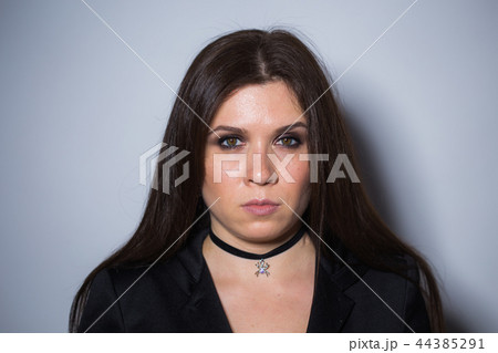 Gorgeous brunette with dark makeup. Halloween witch portrait Gorgeous brunette with dark makeup. Halloween witch portrait 44385291