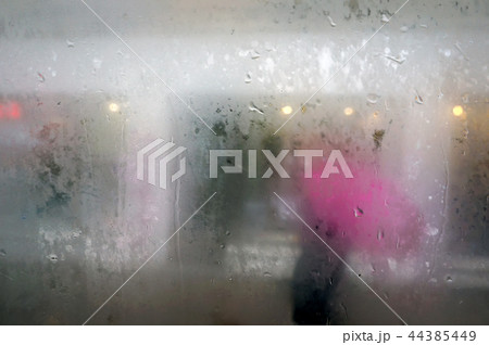 Raindrops on misted glass. Raindrops on misted glass. 44385449