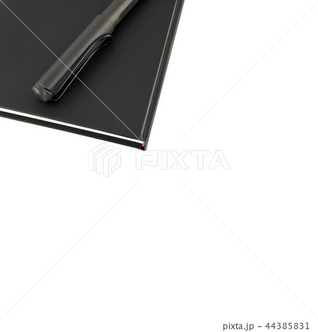 Black notebook and pen over isolated on white  44385831