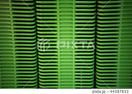 Green plastic home containers tower at store Green plastic home containers tower at store 44387633