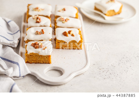 Vegan carrot cake with coconut cream and pecan 44387885