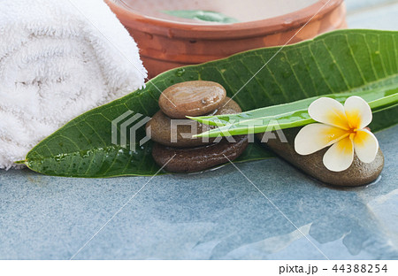 Spa objects with sunlight for massage  44388254