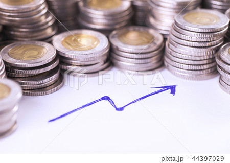 Financial concept, arrow up and coins Financial concept, arrow up and coins 44397029