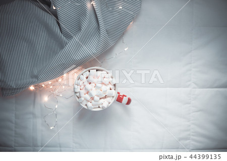 Christmas or New Year morning in bed concept Christmas or New Year morning in bed concept 44399135