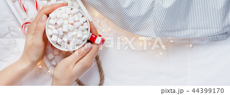 Christmas or New Year morning in bed concept Christmas or New Year morning in bed concept 44399170