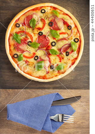 italian pizza at wooden table italian pizza at wooden table 44400651