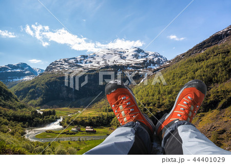 Hiking boots against fjords in Norway Hiking boots against fjords in Norway 44401029
