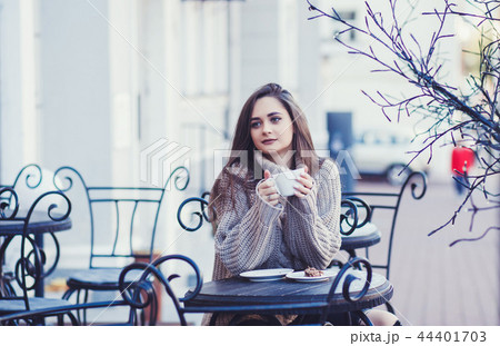 woman with a cup of coffee 44401703