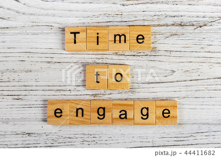 time to engage word made with wooden block concept 44411682