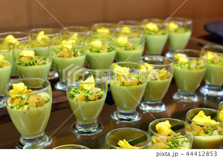 pistachio souffle with raisins in portion glasses pistachio souffle with raisins in portion glasses 44412853