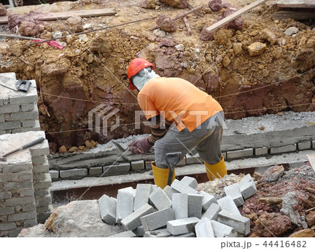 Bricklayer lay brick and stacked it together Bricklayer lay brick and stacked it together 44416482