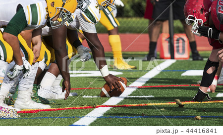 Two football teams lined up over the ball Two football teams lined up over the ball 44416841