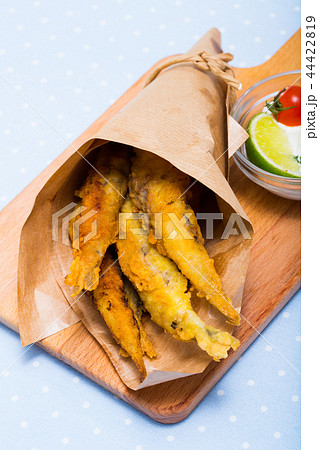 Deep fried anchovies with creamy cheese sauce 44422819