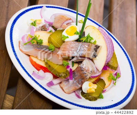 Herring salad with apples and cucumbers 44422892