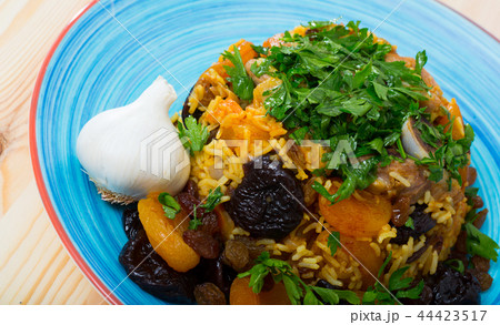 Pilaf from lamb, prunes, dried apricots Pilaf from lamb, prunes, dried apricots 44423517