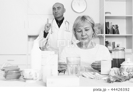 MAture woman and doctor 44426392