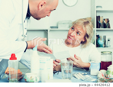 MAture woman and doctor MAture woman and doctor 44426412