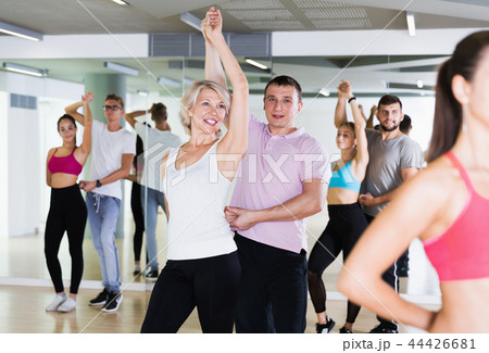 Happy couple of adults dancing pair dance Happy couple of adults dancing pair dance 44426681