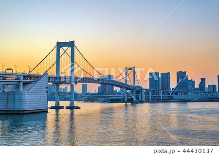 Tokyo Japan, sunset skyline Odaiba Rainbow Bridge 44430137