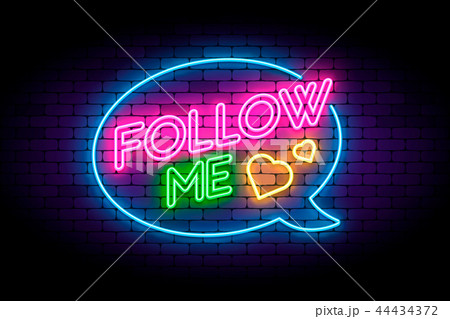 Follow me neon sign on the brick wall with hearts and speech bub 44434372