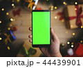 Hand Holding Green Screen Smartphone Christmas 44439901