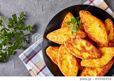 Chvishtari served on a black plate 44440450