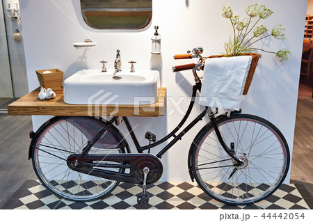 Washbasin and retro bicycle in bathroom Washbasin and retro bicycle in bathroom 44442054