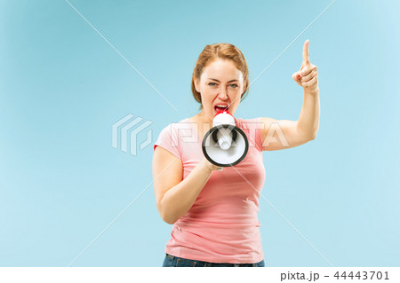 Woman making announcement with megaphone 44443701