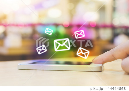 Woman hand using mobile phone with email Woman hand using mobile phone with email 44444868