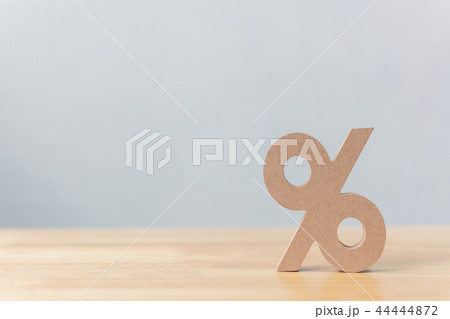 Percentage sign symbol icon wooden on wood table Percentage sign symbol icon wooden on wood table 44444872