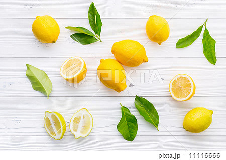 Fresh lemons and lemons leaves on white wooden. Fresh lemons and lemons leaves on white wooden. 44446666