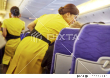 Blurred Flight serving passengers 44447412