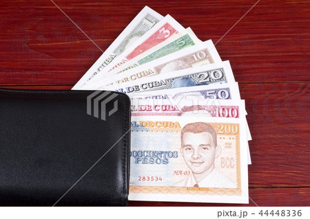Cuban money in the black wallet  44448336