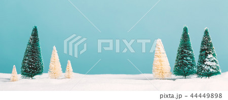 Small green and white Christmas trees 44449898
