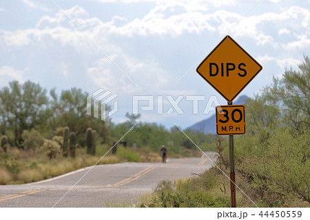 アメリカの道路標識 Dip うねり に注意の写真素材