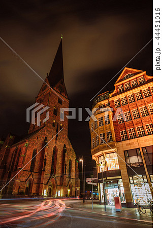 City view of Hamburg downtown at night. View of St. Petri church and traditional red brick buildings 44451016