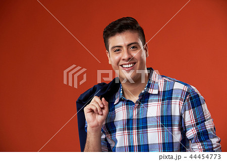 Smiling latin young man 44454773